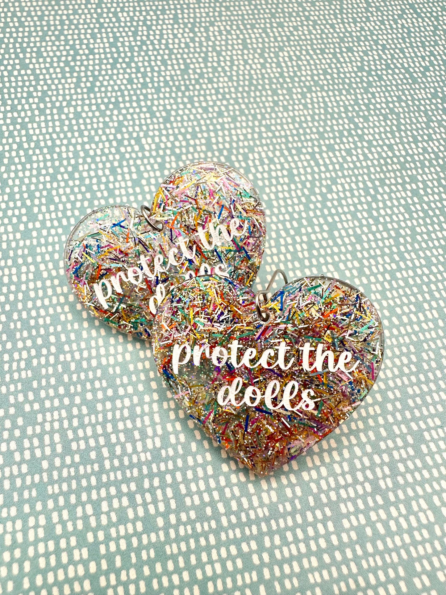 Protect The Dolls Heart Earrings