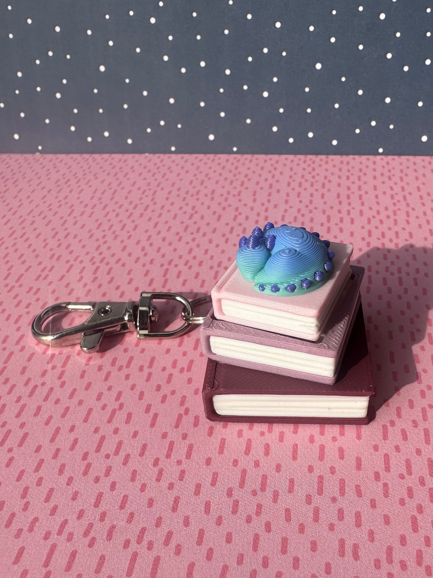 Book Stack with Dragon Fidget Clicker Keychain - CLICKY