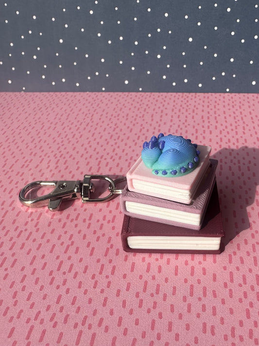 Book Stack with Dragon Fidget Clicker Keychain - CLICKY